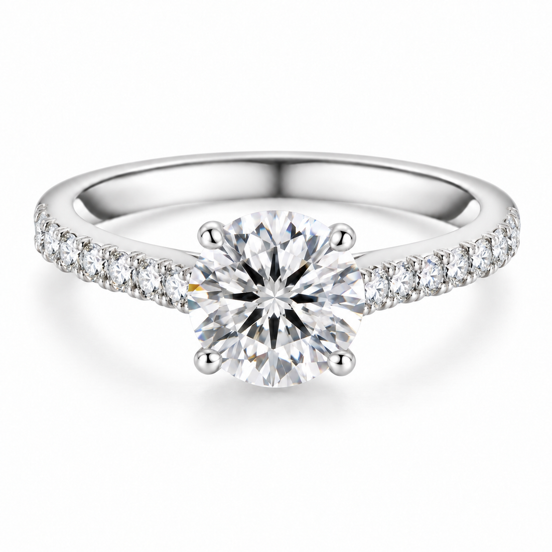 Round moissanite engagement ring with a four-prong centre stone and stone-set shoulders, white gold plated, product photo