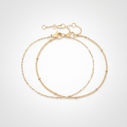 The Fine Chain Bracelet Set by JUSMIR, two delicate chain bracelets, studio product photo