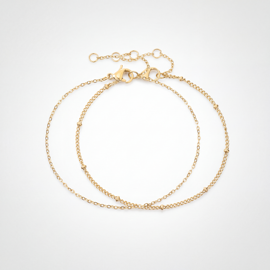 The Fine Chain Bracelet Set by JUSMIR, two delicate chain bracelets, studio product photo