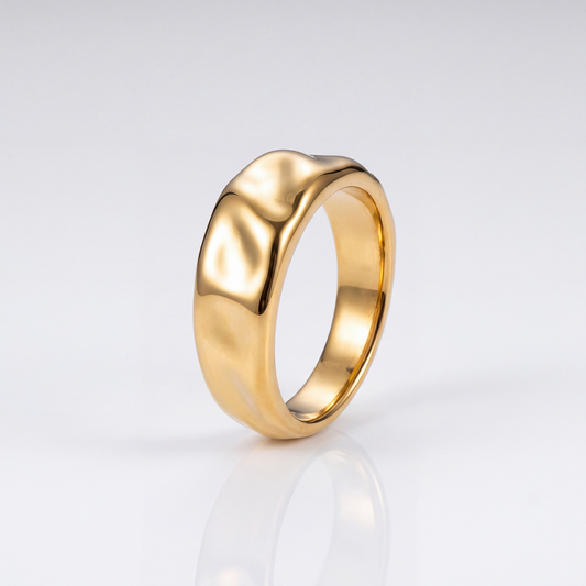The Ripple Ring by JUSMIR, gold-tone rippled band ring, studio product photo