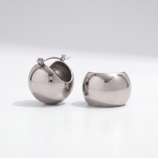 The Sculptural Hoops by JUSMIR, rounded hollow hoop earrings, studio product photo