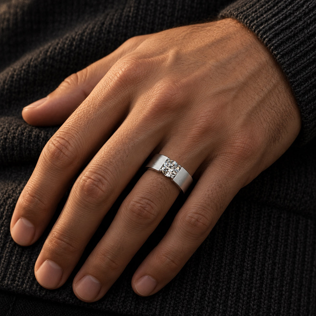 The Men's Moissanite Ring worn by a model
