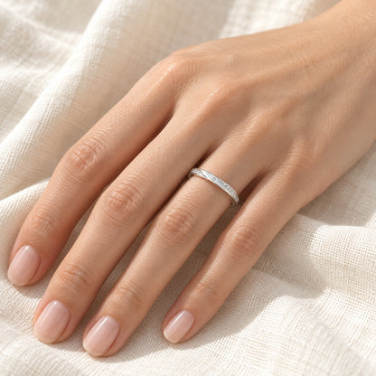 The Pavé Moissanite Band worn by a model in natural daylight