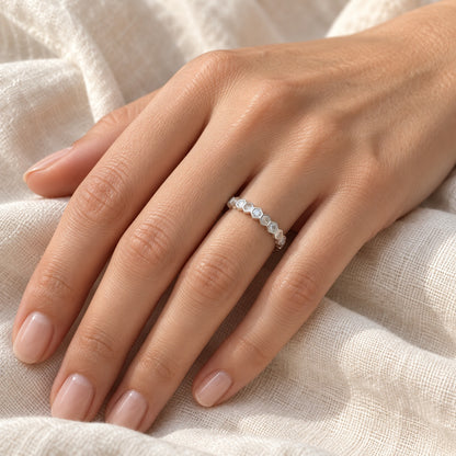 The Hexagon Moissanite Eternity Band worn by a model in natural daylight