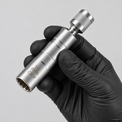 16 mm magnetic spark plug socket held in a gloved hand to show its size