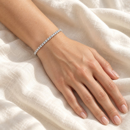 The Moissanite Tennis Bracelet worn on the wrist in natural daylight, shown in 3 mm, white gold plated